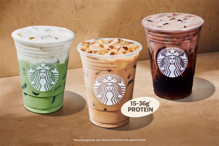 What milk does Starbucks use for lattes?